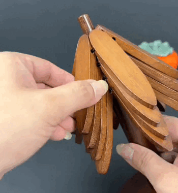 Sottopentola pieghevole in legno