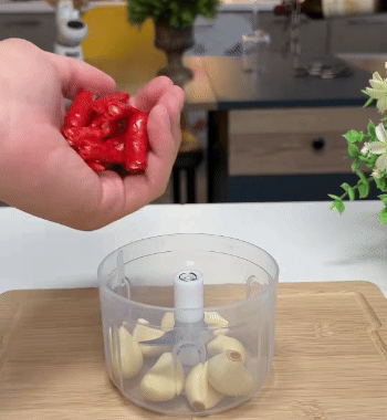 Trita aglio elettrico