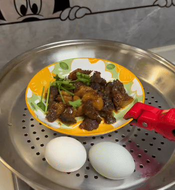 Pinza antiscottatura per piatti e ciotole