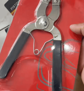 Pinza per fasce elastiche