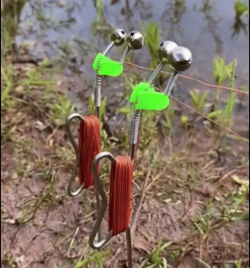 Canna da pesca con campanelli e clip allarme
